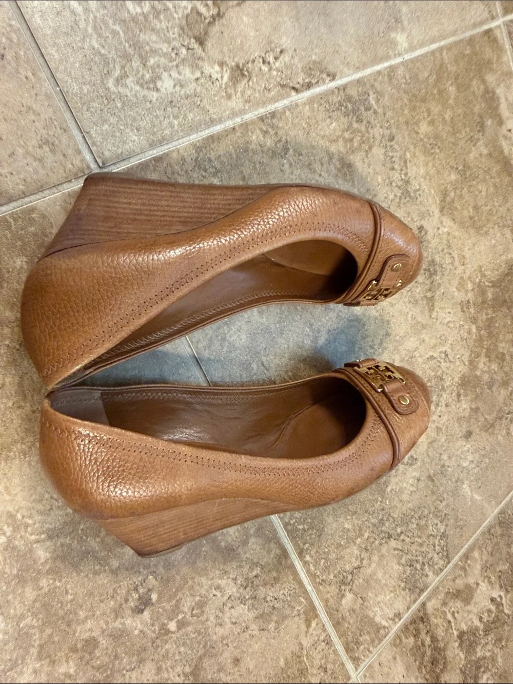 Tory Burch Cognac Leather Logo Cap-Toe Heels- worn on the front
